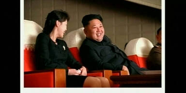 Bilder von Kim Jong Un und seiner Frau