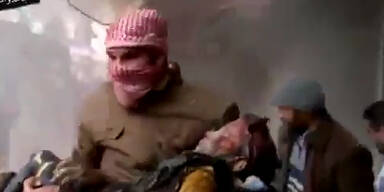 18 GRAPHIC Assad bombing unarmed civilians in aleppo syria 06012014 - YouTube.mp4.Standbild001.jpg