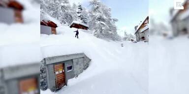 20210317_66_529231_Guy_Snowboards_Down_Snow_Covered_Switzerland_Streets.jpg