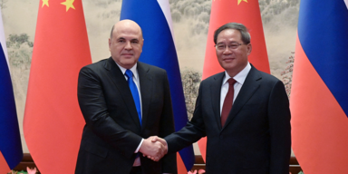 Russian Prime Minister Mikhail Mishustin and Chinese Premier Li Qiang