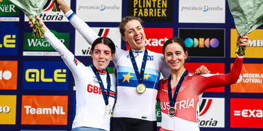 silver medallist Britain's Anna Henderson, gold medallist Switzerland's Marlen Reusser and bronze medallist Austria's Christina Schweinberger pose on the podium for the women's individual time trial on the first day of the 2023 European Cycling Championships in Emmen on September 20, 2023.