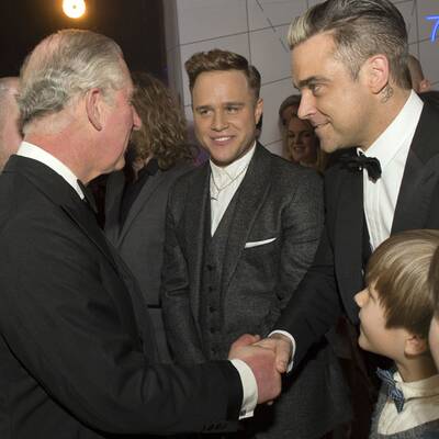 Prinz Charles darf Robbie & Co. die Hand schütteln