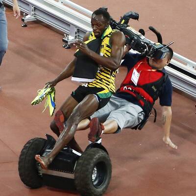 Kameramann mäht Usain Bolt um 