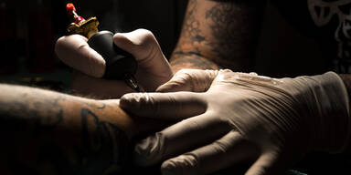 Tattoo Tatoo-Artist tätowieren