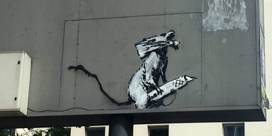 Banksy Ratte mit Teppichmesser