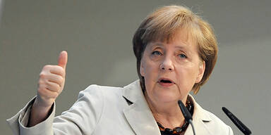 Angela Merkel *thumbs up*