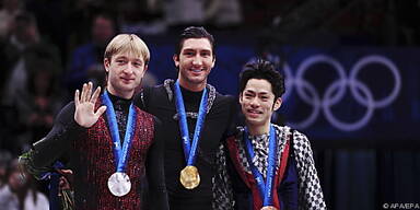 Lysacek (M) mit Gold, Pluschenko (l) mit Ärger