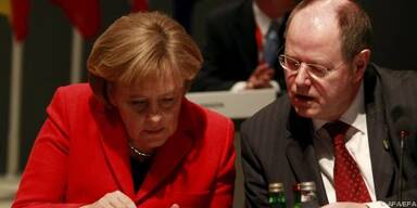 Merkel und Steinbrück dämpfen Erwartungen