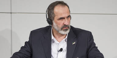 Syrischer Minister will Oppositionschef treffen
