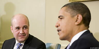 Reinfeldt (l.) will Obama ins Boot holen