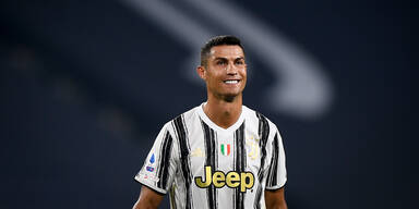 Fußball-Star Cristiano Ronaldo grinst