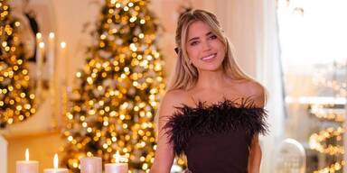 Festlicher Glamour: Die schönsten Star-Looks unterm Weihnachtsbaum