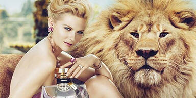 Kirsten Dunst posiert nackt und mit Löwe
