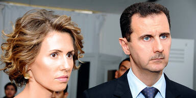 Assad mit Frau Asma