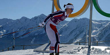 Marit Björgen holt Skiathlon-Gold