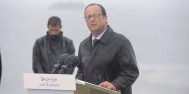Das Netz spottet über triefnassen Hollande