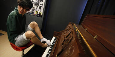 Armloser Pianist ist Chinas "Supertalent"