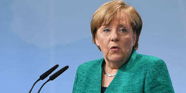 Merkel: Opfer der Krawalle werden entschädigt