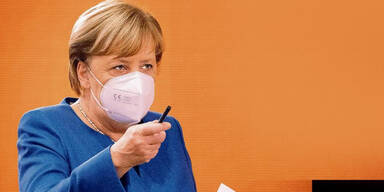 Trug Merkel Fake-Maske aus China? | Corona-Virus
