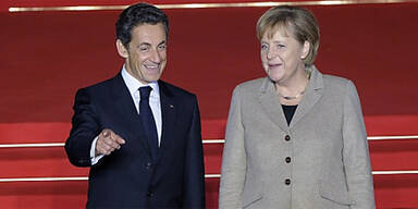 Merkel & Sarkozy einig über Defzitstrafe